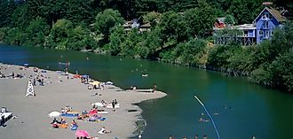 Aerial view over people swimming in the Russian river in Monte Rio, California