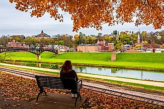 Autumn view of Grant Park in Galena, Illinois, with vibrant fall foliage and the historic town in the background.