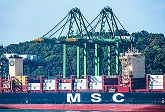 Container terminal with gantry cranes and berthed MSC merchant ship during cargo operation in port of Balboa, Panama. Image credit Mariusz Bugno via Shutterstock