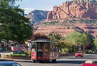 Sedona Trolley giving a tour of Sedona, Arizona and scenery, in spring. Image credit Wollertz via Shutterstock