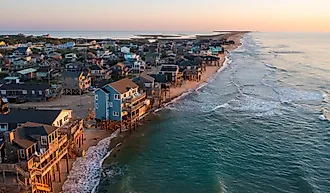 Aerial view of homes right on the shoreline in Buxton, North Carolina.
