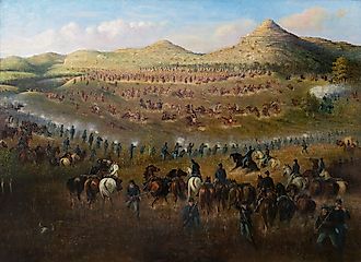 The Eighth Minnesota Infantry (Mounted) in the Battle of Ta-Ha-Kouty (Killdeer Mountain), c.1910 Painter: Carl Ludwig Boeckmann Collection of the Minnesota Historical Society. Photo via WikimediaCommons