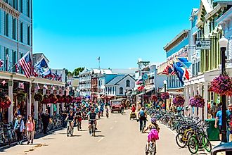 A busy day in downtown Mackinac Island, Michigan. Image credit: Michael Deemer via Shutterstock.com.