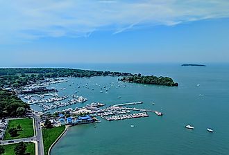 Aerial view of South Bass Island, including the harbor and town from Perry's Victory and International Peace Memorial, Put-in-bay, Ohio. Image credit LukeandKarla.Travel via Shutterstock