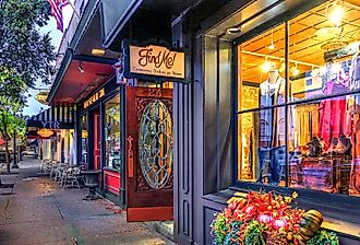 Sidewalk view of Main Street with quaint upscale shops in the historic village of Chagrin Falls, Ohio. Image credit Lynne Neuman via Shutterstock.