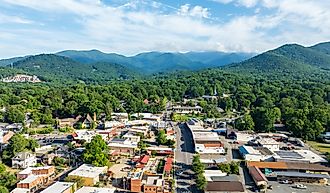 Aerial view of Black Mountain, NC, showcasing a charming town surrounded by lush green forests and mountainous landscape. Editorial credit: Red Lemon / Shutterstock.com