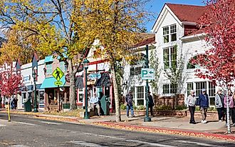 View of golden and red trees in downtown Estes Park, Colorado. By Frank Schulenburg, CC BY-SA 4.0, Wikimedia Commons. https://commons.wikimedia.org/w/index.php?curid=154080818