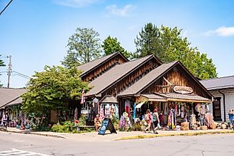 Street scene from historic downtown Nashville, Indiana, in Brown County, featuring people strolling along the sidewalks.  Editorial credit: Little Vignettes Photo / Shutterstock.com