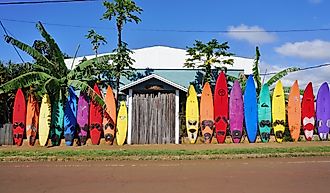 Surfboards in bright colors in Paia, Maui. (Image credit: EQRoy via Shutterstock.)
