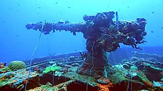 Machine gun on ship sunk during Operation Hailstone in Chuuk Lagoon, Micronesia (Credit: SylvainPH / Shutterstock)