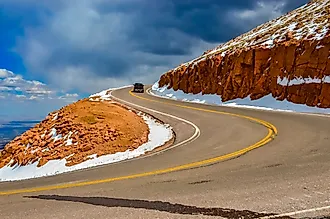 The road to the snow-covered mountain Pikes Peak, Colorado