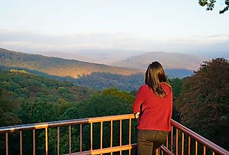 Woman overlooking scenery along Boston Mountains Scenic Loop in Arkansas