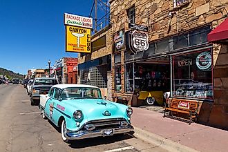 treet scene with classic car in front of souvenir shops in Williams, one of the cities on the famous Route 66. Editorial credit: Jordi C / Shutterstock.com