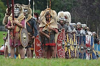 Roman legion display at the Roemerfest in the roman village of Augusta Ruarica located in Augst, Switzerland. Via Shutterstock / Franziska Guedel.
