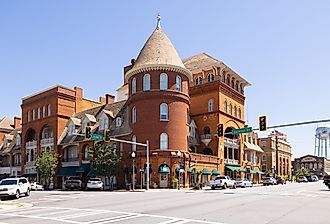 The Americus Historic District, Georgia with cars on the street and the water tower in the distance. Image credit Roberto Galan via Shutterstock
