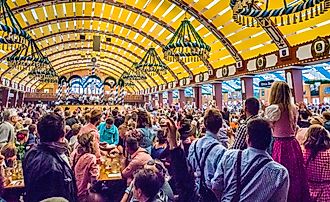 Interiors of Loewenbraeu-Festhalle tent at the Oktoberfest in Munich, Germany. Oktoberfest is the world's largest beer festival.