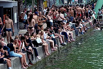 Parisians swim in the Saint Martin canal on a sweltering day