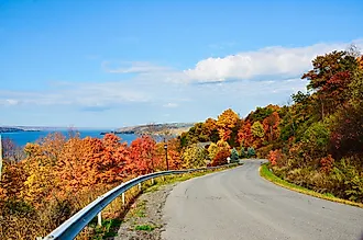 Scenic drive overlooking Cayuga Lake, the longest of New York's Finger Lakes. Credit: PQK / Shutterstock