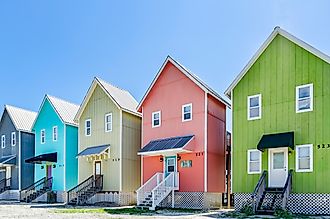 Colorful beach houses along the coast in Dauphin Island, Alabama. Image credit Carmen K. Sisson via Shutterstock