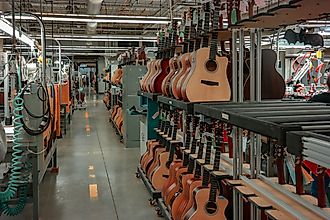 : Guitars on the assembly lines in the factory of the Martin Guitar Company Editorial credit: George Sheldon / Shutterstock.com