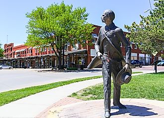 Bronze sculpture of Wyatt Earp as part of the Trail of Fame in Dodge City, Kansas. Image credit: Michael Rosebrock / Shutterstock.com.