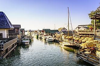 Leland, Michigan, August 8, 2016: Fishtown docks in Leland, Michigan - a popular summer vacation destination. Editorial Photo Credit: Alexey Stiop
