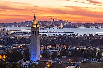 Sather Tower in UC Berkeley and San Francisco City Skyline at Sunset