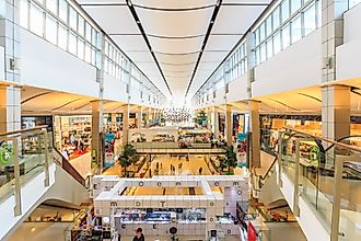 People shop at Central World in Bangkok. Editorial credit: Tooykrub / Shutterstock.com