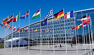 The national flags of countries member of the NATO fly outside the organisation headquarters in Brussels, Belgium.