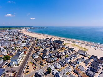 Hampton Beach aerial view including historic waterfront buildings on Ocean Boulevard and Hampton Beach State Park.