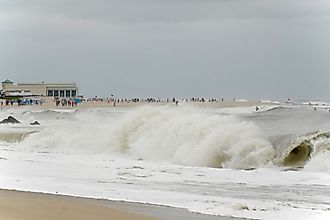 Rough seas, rip currents and high winds caused by Hurricane Erin batter and flood Cape May's iconic Atlantic coast beaches, Editorial credit: George Wirt / Shutterstock.com