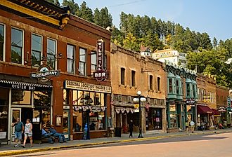Historic saloons, bars, and shops in Deadwood, South Dakota, in the fall. Image credit Kenneth Sponsler via Shutterstock