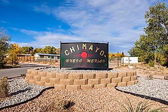 Welcome sign along Highway 76 in Chimayo, New Mexico. Editorial credit: Fotoluminate LLC / Shutterstock.com