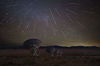 The Geminid Meteor shower taking place above the Very Large Array in New Mexico. Via Shutterstock / Liang Li Photos.