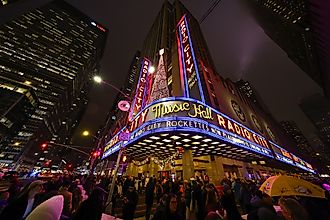 The iconic marquee of Radio City Music Hall. Via Shutterstock / Gordon Donovan