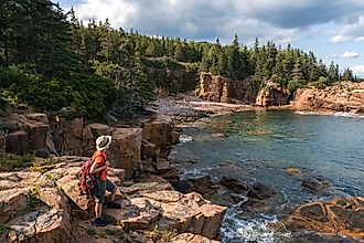 A visitor to Acadia National Park. Shutterstock.com