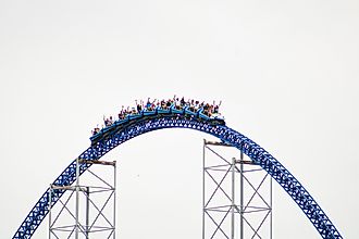 The train of Millennium Force crests a hill at Cedar Point in Sandusky, Ohio. Via Shutterstock / CJDPhotos