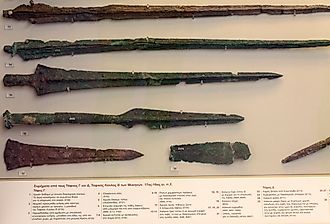 Various weapons of the bronze age found in the tombs of the ancient Mycenae, Athens archaeological museum, Greece. Image credit johzio via Shutterstock.