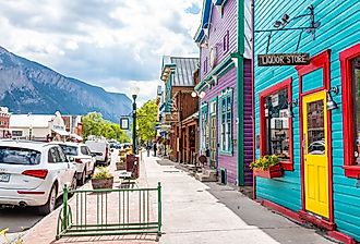 Colorful vivid village houses and downtown street in summer in Crested Butte, Colorado. Image credit Kristi Blokhin via Shutterstock