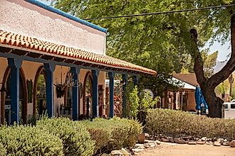 Editorial Photo Credit: Matt Gush via Shutterstock. Tubac, Arizona, USA - May 29, 2022: Afternoon sunlight shines on the downtown art galleries and stores of historic Tubac.