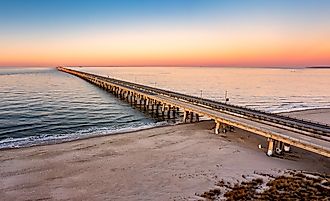 Aerial panorama of the Chesapeake Bay Bridge Tunnel at sunset.