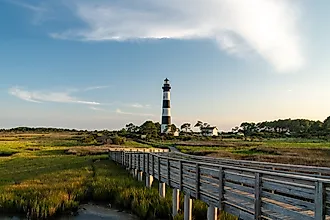Bodie Island Lighthouse station at the Coastal wetlands and marsh of Cape Hatteras National Seashore - Outer Banks North Carolina. Credit: melissamn/Shutterstock.com