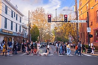  Pedestrians cross Main Street in New Hope, Pennsylvania