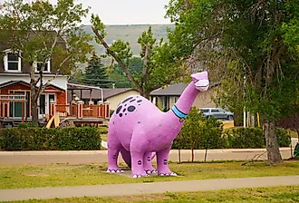 Fiberglass sculpture of a pink diplodocus in Drumheller, Alberta, Canada. Image credit Alexandre.ROSA via Shutterstock
