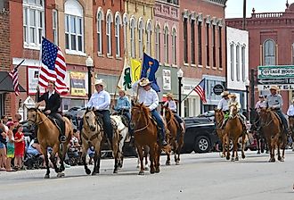 Main Street in Council Grove, Kansas, during the Washunga Days Parade. Image credit Mark Reinstein via Shutterstock.