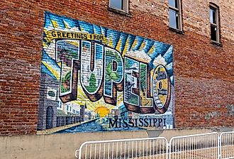 Tupelo, MS mural in downtown Tupelo, MS. Image credit Chad Robertson Media via Shutterstock.