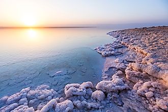 Salt on the shore of the Dead Sea. Jordan sunset landscape