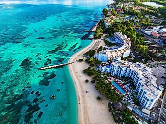 Aerial view of Montego Bay waterfront with hotel and beaches.