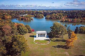 The historic white masonry Temple to Music along Cunliff Lake in Providence, Rhode Island.