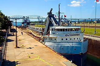 Great Lakes freighters passes through the Soo Locks at Sault Ste Marie Michigan, Editorial credit: Dennis MacDonald / Shutterstock.com